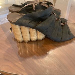 Ferragamo black fabric sandal, with brown leather straps. A must for spring!